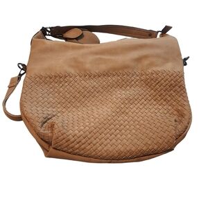 Kilamal  brown purse. Three compartments on the inside. Double shoulder …